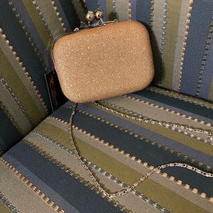 Gold clutch evening bag